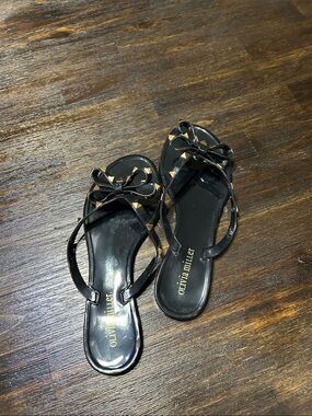Olivia Miller Black Bow Jelly Sandals with Gold Studs